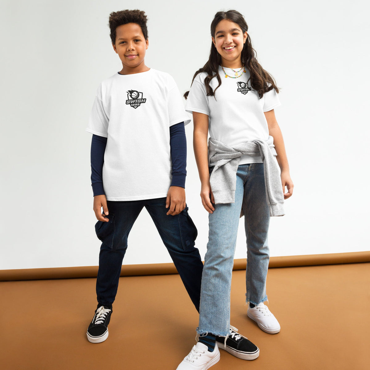 Two kids wearing Swish Squad T-shirts